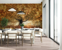 A graceful subtle leaf wall mural in soft, golden tones.