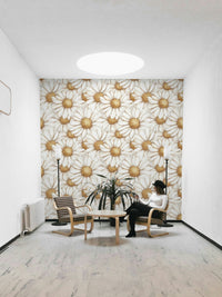 Floral wallpaper with golden accents featuring delicate daisies.

