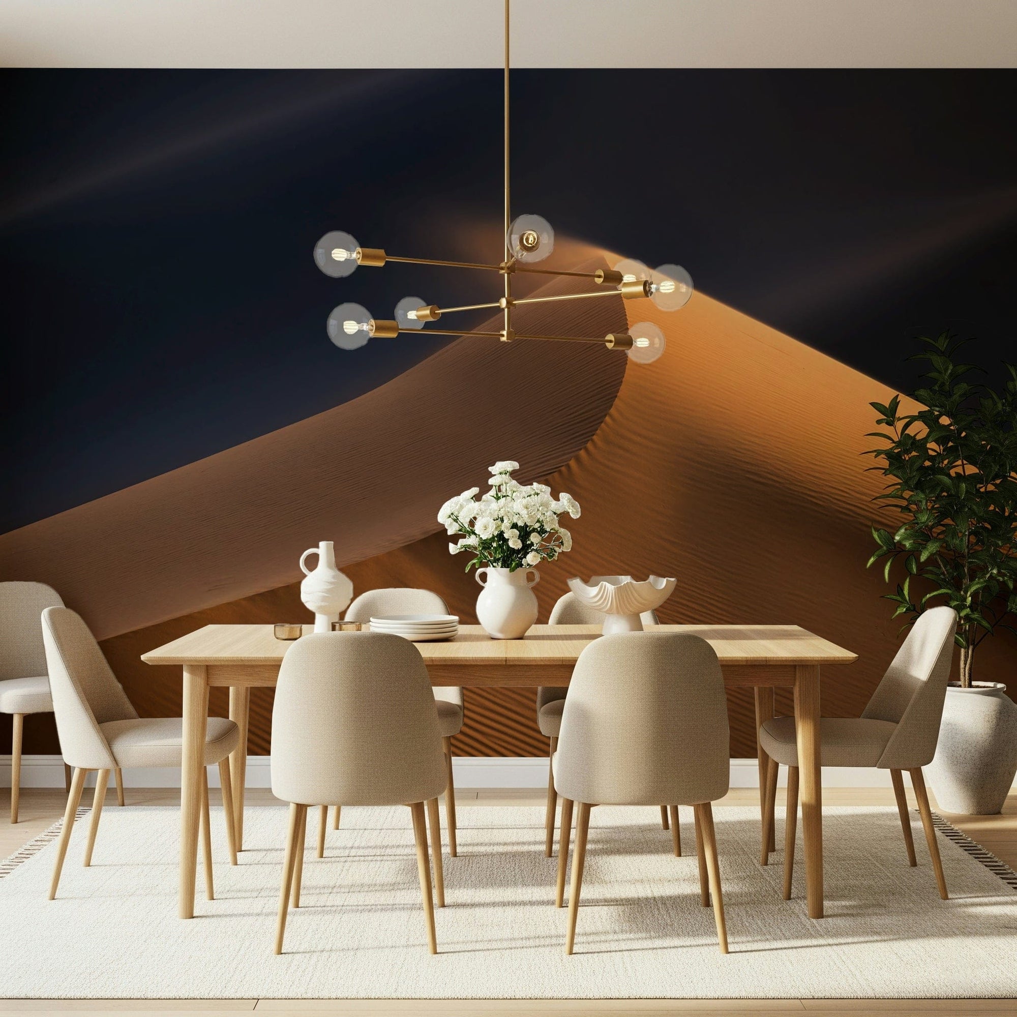 Serene Desert Rise wallpaper mural of a golden dune under a dark navy sky behind a wood dining table with beige chairs