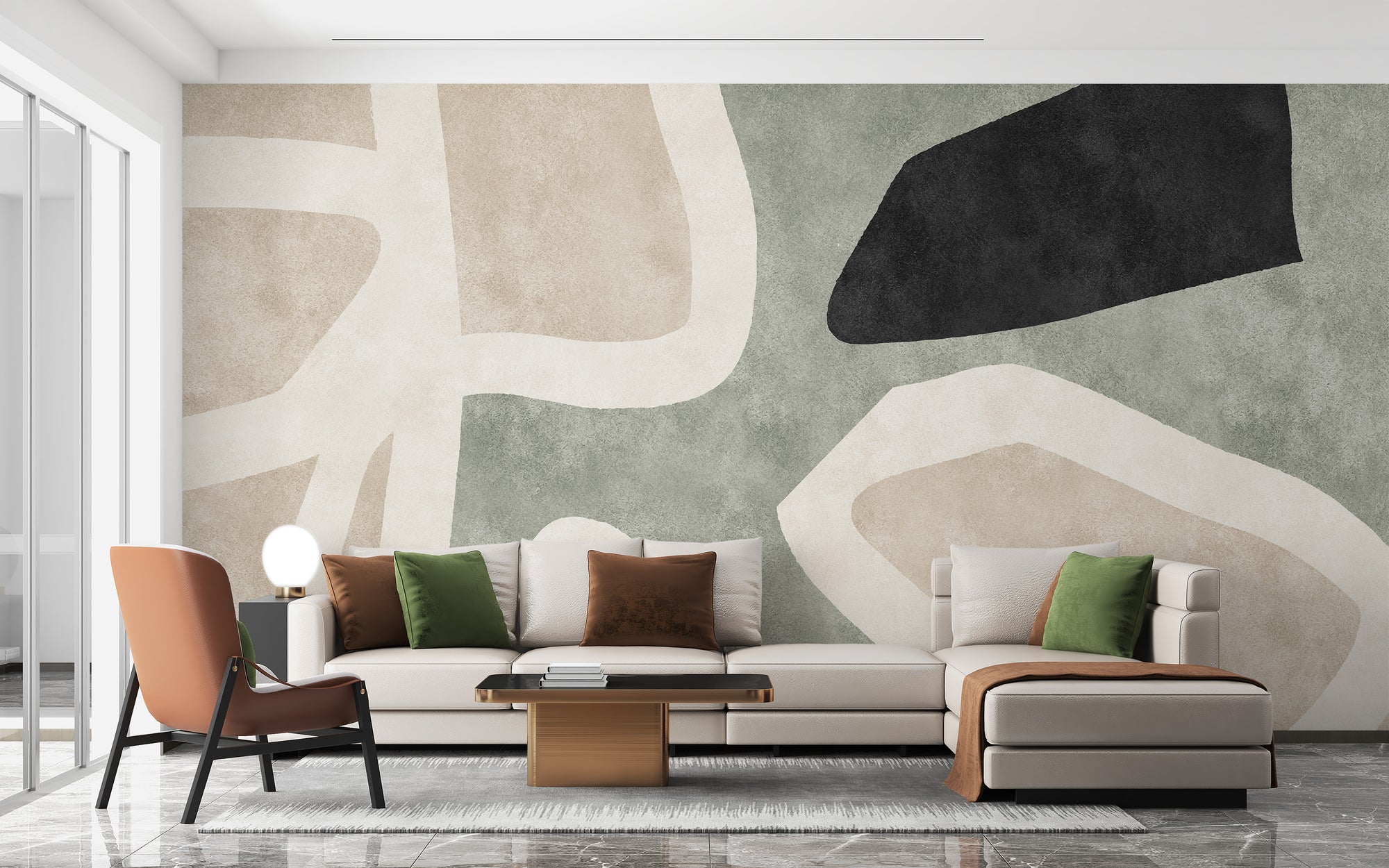 Golden Geometric Abstract wallpaper mural in beige and sage with black shapes behind a cream sectional sofa