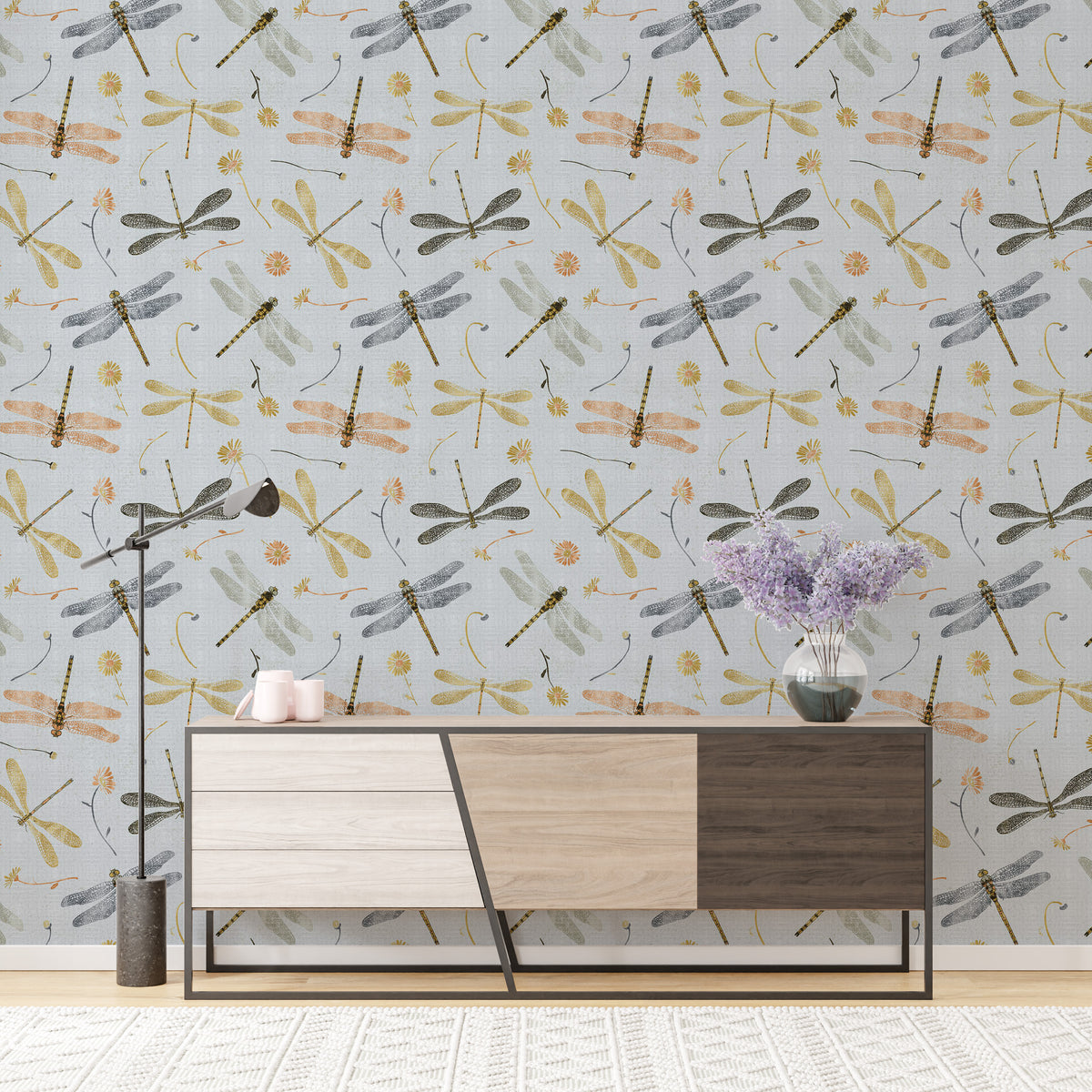 Dragonfly Damselfly Golden Gray wallpaper in a living room above a two-tone sideboard with lavender in a vase