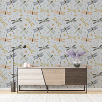 Dragonfly Damselfly Golden Gray wallpaper in a living room above a two-tone sideboard with lavender in a vase
