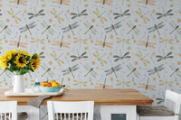 Dragonfly Damselfly Golden Gray wallpaper in a dining room with sunflowers and oranges on a wood table