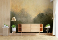 Golden Valley Haze wallpaper mural of dark misty trees behind a light-wood sideboard and woven pendant in a living room