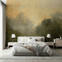 Golden Valley Haze wallpaper mural of a golden hazy valley over a white bed with blush throw and twin lamps in a bedroom
