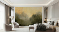 Golden Valley Haze wallpaper mural of misty trees and amber sky above a beige bed and cream armchairs in a bedroom