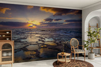Self adhesive ocean wallpaper for wall in a bright, airy sunroom.

