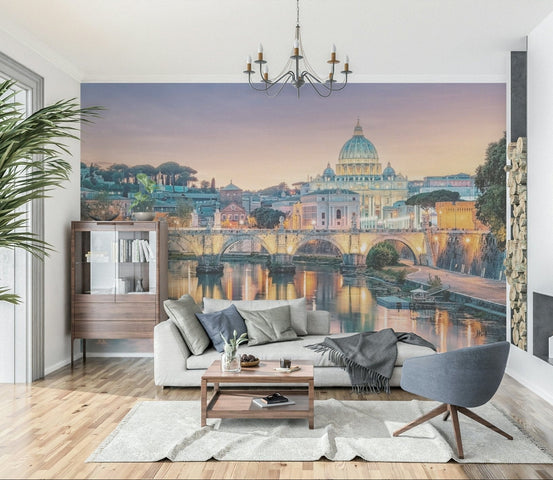 Golden Hour in Rome wallpaper mural of St Peter's dome and the Tiber behind a white sofa and gray armchair