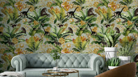 Jungle-inspired wallpaper with animals and vivid green leaves, accented by gold.


