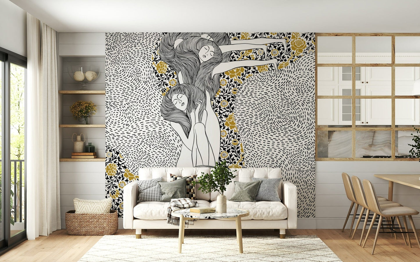 Golden Reverie wallpaper mural with gold florals behind a cream sofa by white shelving