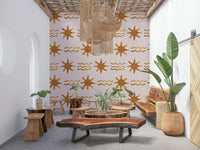 Sun-inspired mural with shimmering golden waves and warm, glowing tones.