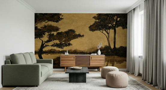 Golden Mist Waterscape wallpaper mural with dark trees on golden sky behind a green sofa in a living room