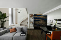 A minimalist interior with the ocean-themed wallpaper.

