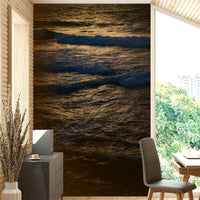 The wallpaper is used as a feature wall in a bedroom.

