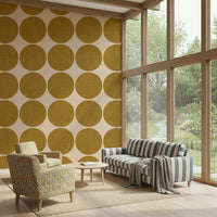 Ochre orb weave wallpaper featuring large ochre circles with a woven texture on a soft beige background