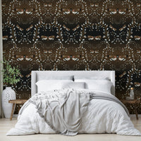 Moody botanical wall mural with dark details

