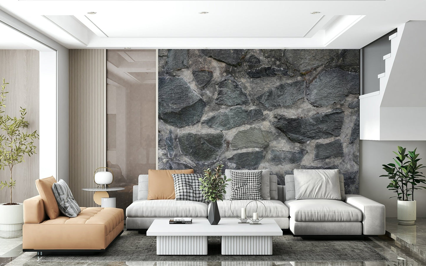Granite Blocks wallpaper mural of grey stone behind a camel chaise and grey sectional in a living room