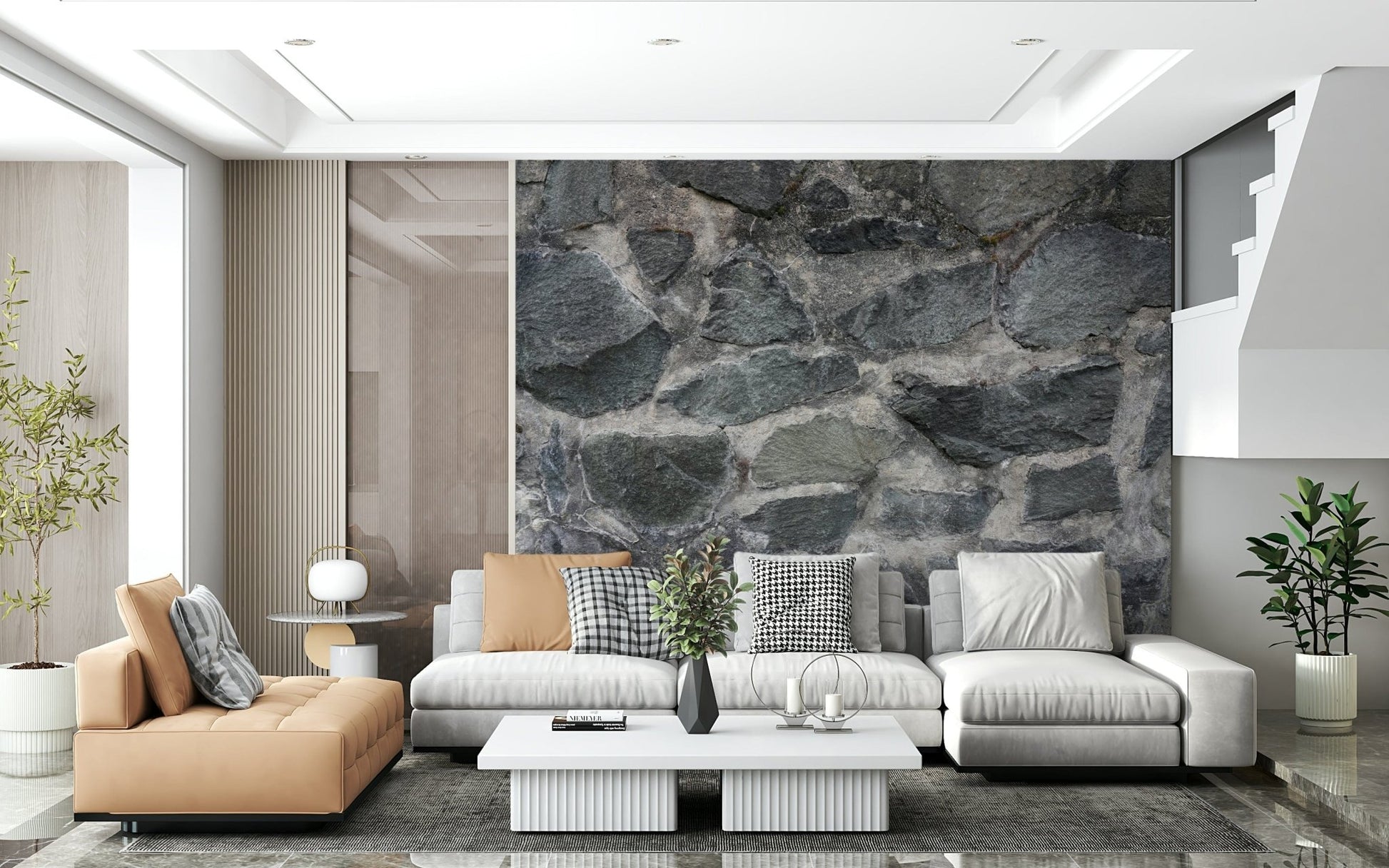 Granite Blocks wallpaper mural of grey stone behind a camel chaise and grey sectional in a living room