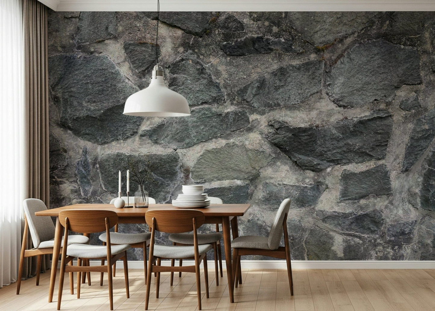 Granite Blocks wallpaper mural of grey masonry above a walnut dining table and chairs in a dining room