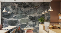 Granite Blocks wallpaper mural of grey stone in a cafe with pastel chairs, pendants and a pastry counter