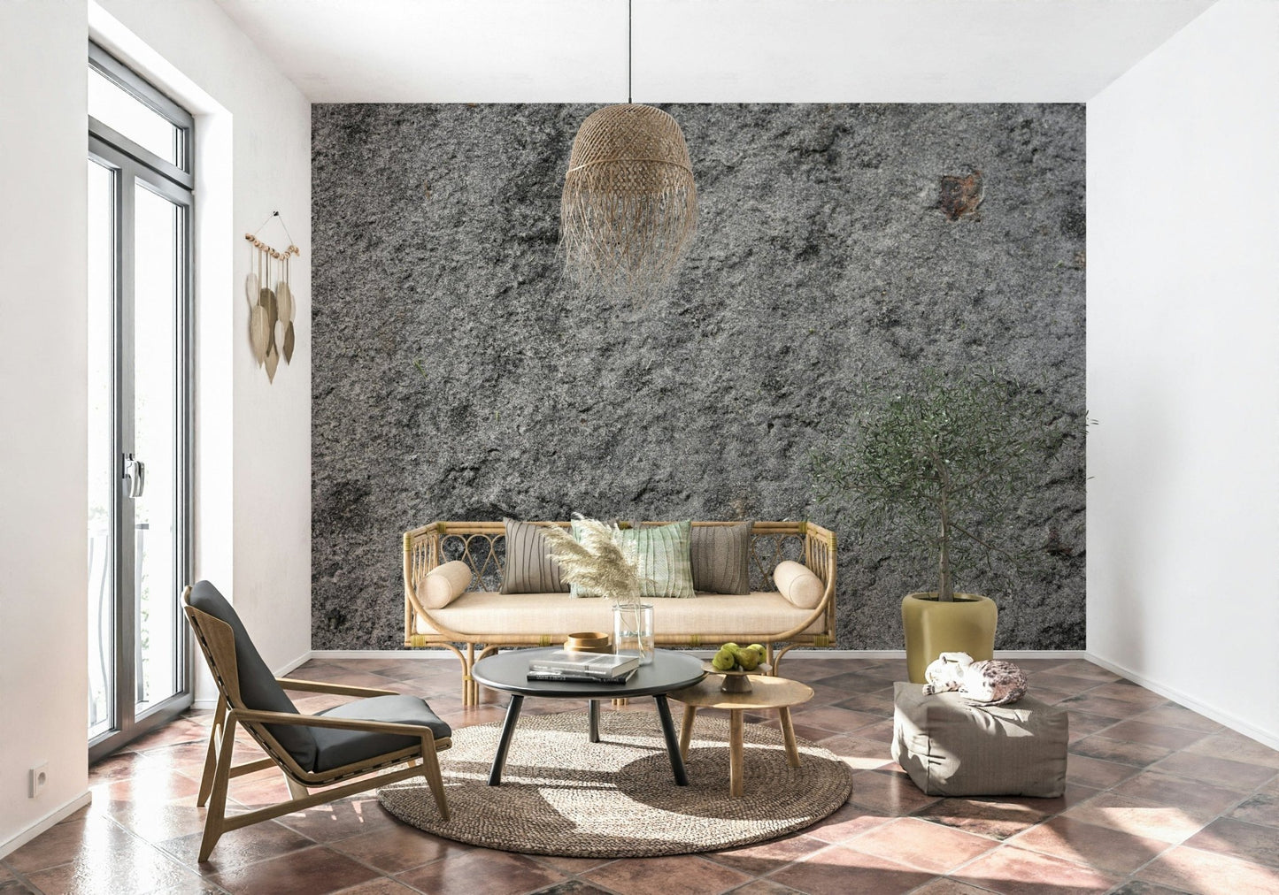 Granite Gray wallpaper mural behind a rattan daybed under a wicker pendant with an olive tree