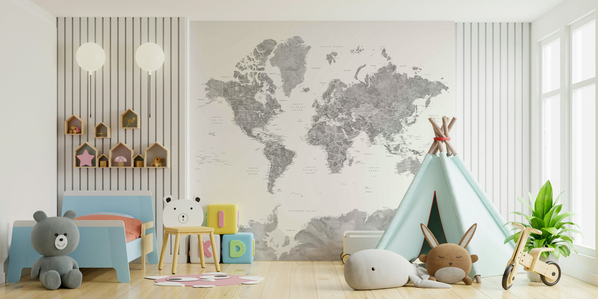 Gray Watercolor World Map wallpaper mural in soft gray in a kids room with a blue toddler bed and teepee
