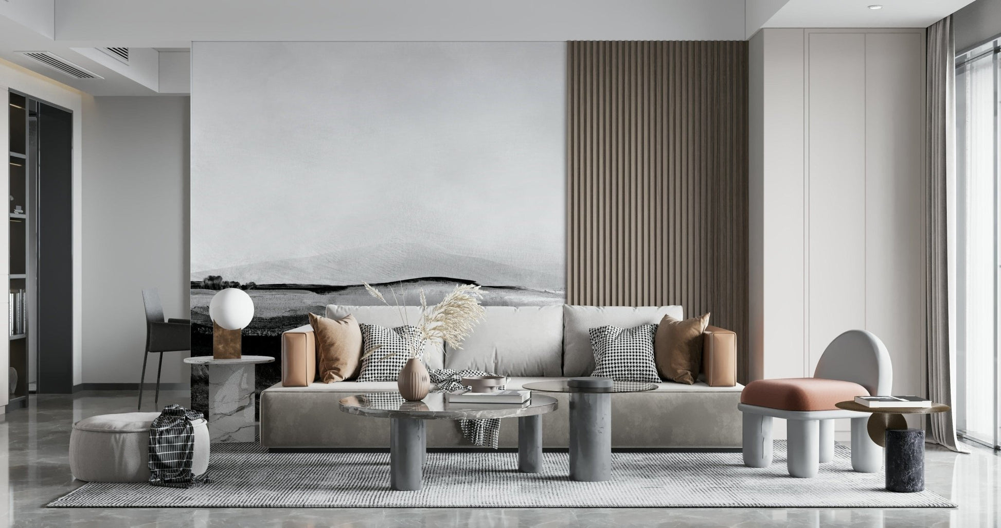 Grayscale Hills wallpaper mural behind a beige sofa in a bright living room with marble round coffee tables
