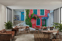 A beautiful wide-angle wall mural of a seaside village.

