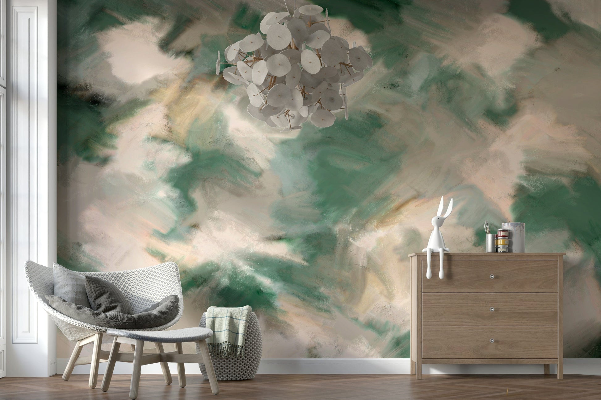 Ethereal Brushstrokes wallpaper mural of green strokes in a nursery with wicker chair, wood dresser and capiz chandelier