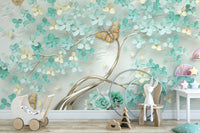 Green Flowers Golden Butterfly wallpaper mural in soft teal behind a white toy pram and bunny in a pastel nursery