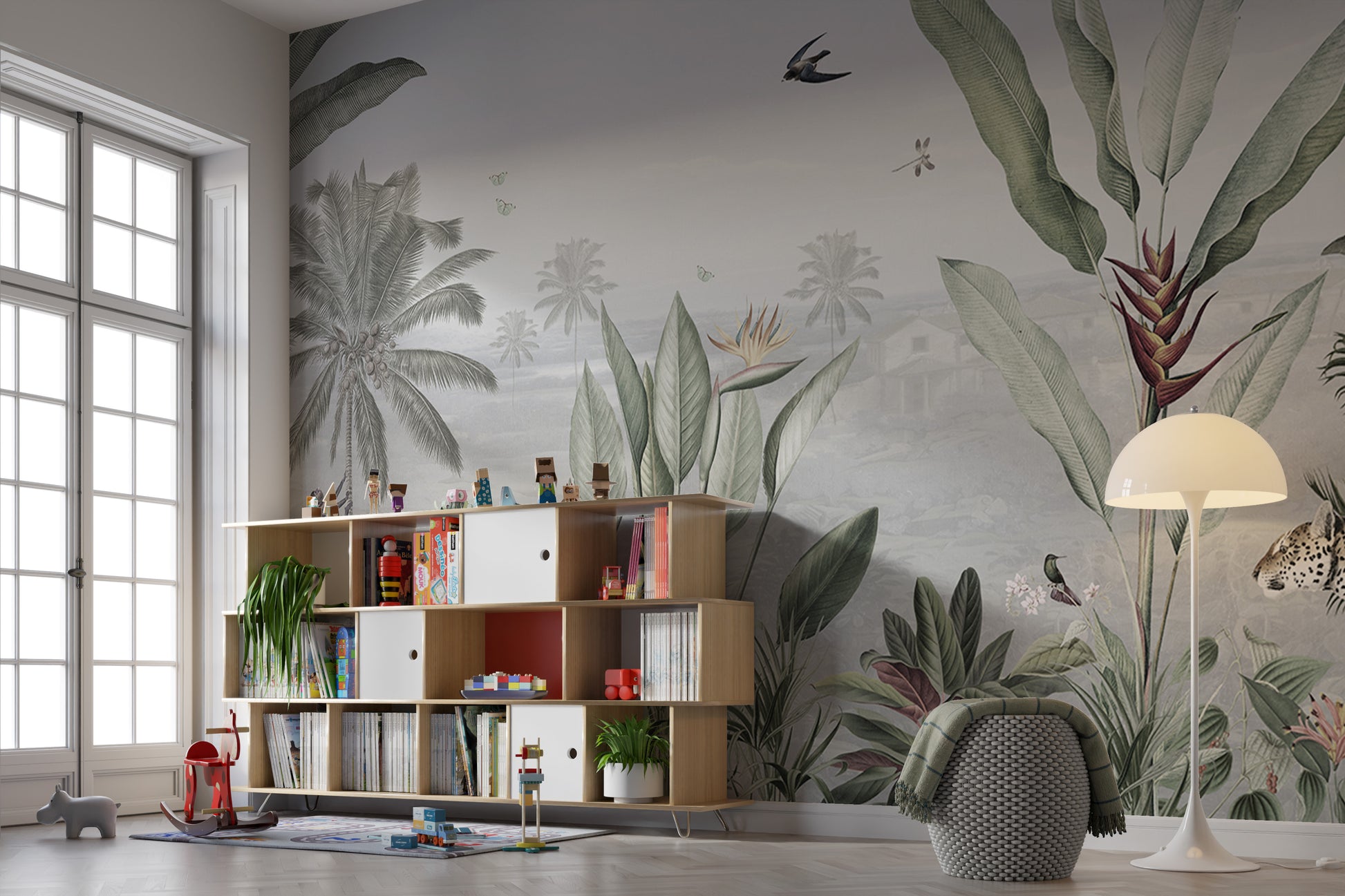 Green Forest Birds wallpaper mural of palms and banana leaves behind a low toy shelf in a kids playroom