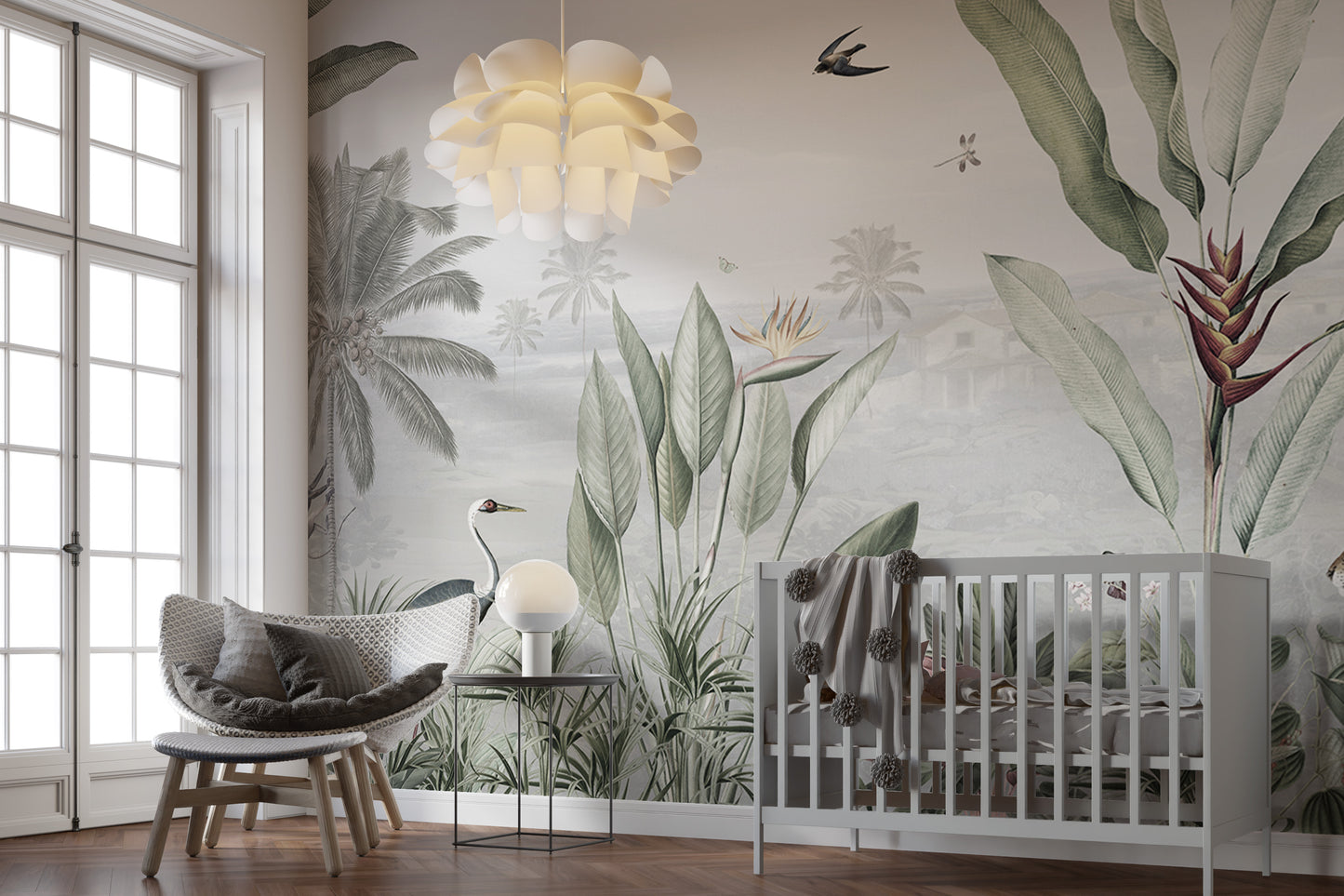 Green Forest Birds wallpaper mural with palms and a crane behind a grey crib and rattan chair in a nursery
