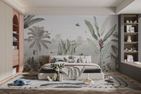 Green Forest Birds wallpaper mural of tropical palms and birds behind a low bed in a child's bedroom