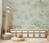 The design features stylized, linear ginkgo leaves.

