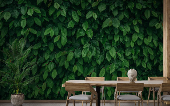 Dense Tropical Leaves wallpaper mural shown as a full feature wall that highlights the design