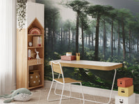Green Tropical Foggy Forest wallpaper mural of misty pines above a white desk in a kids study room