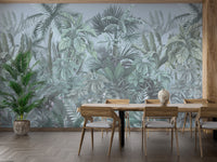 Green Tropical Leaf Forest wallpaper mural as a feature wall in a home office workspace
