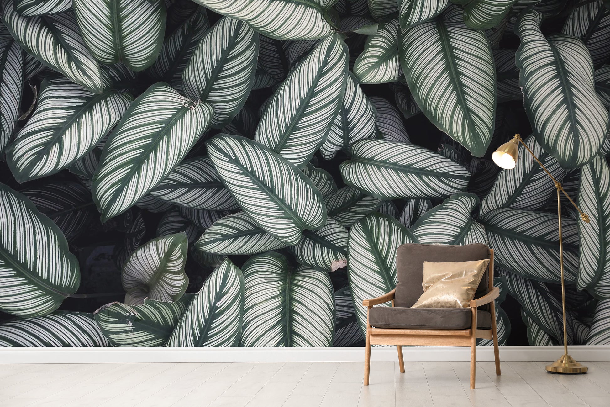 Green White Leaves wallpaper mural as a bedroom feature wall behind the headboard in green tones
