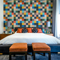 The wallpaper is applied seamlessly, giving the wall a uniform, high-end look.

