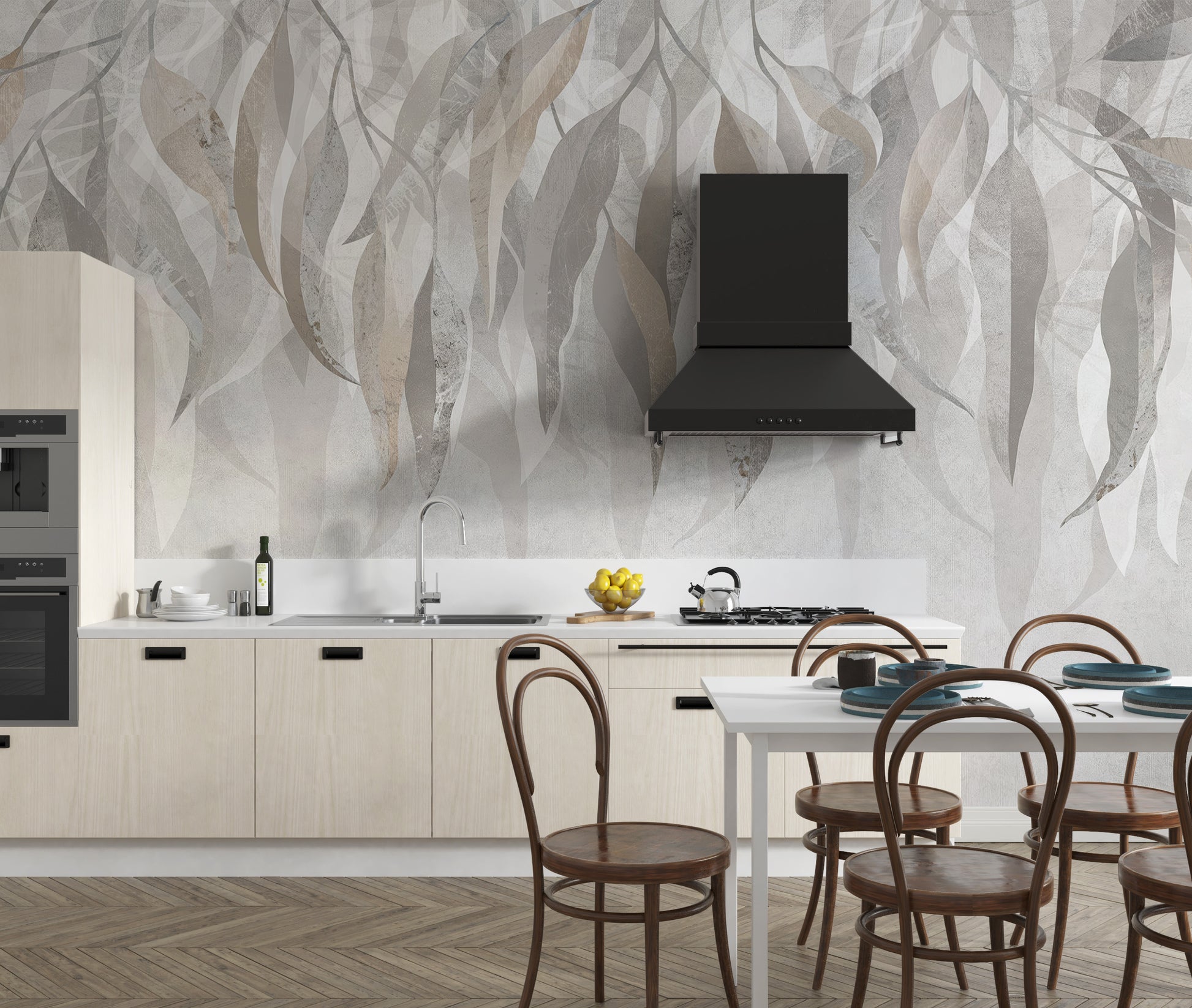 Grunge Gleam wallpaper mural with beige and grey leaves behind a cream kitchen with black range hood and dining chairs
