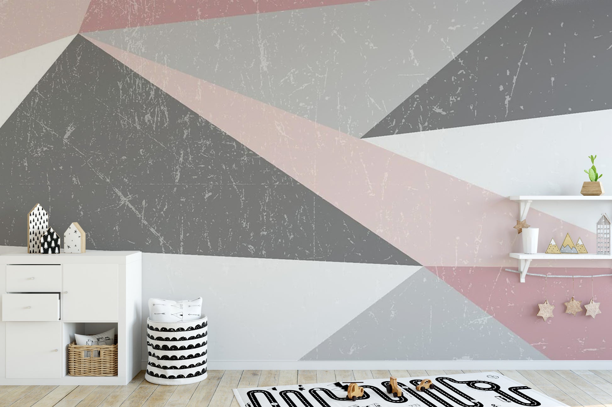Minimalist geometric plyaroom wall mural featuring distressed soft blue triangles.