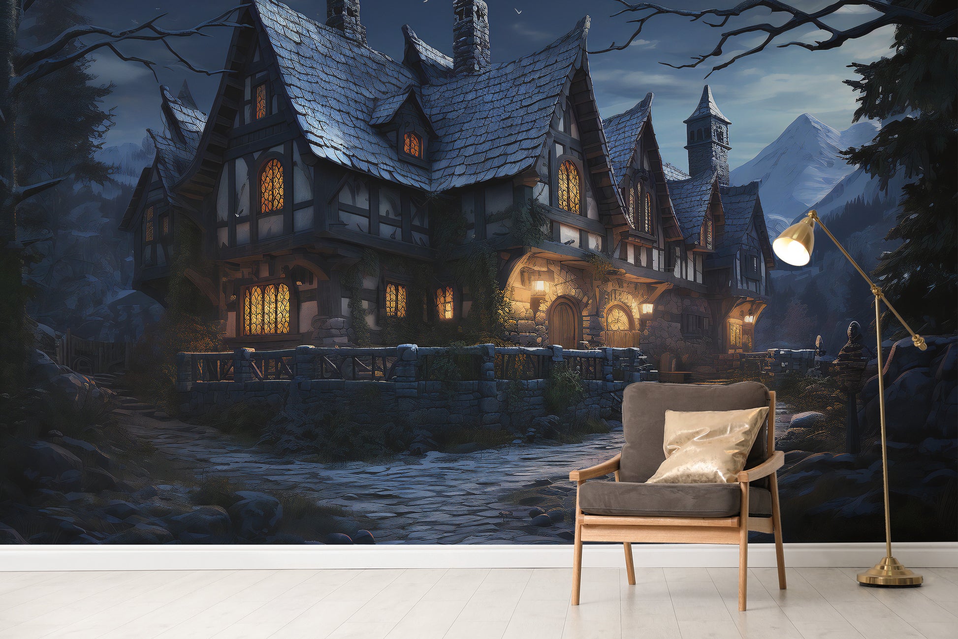 Halloween Haunted Cottage wallpaper showing a moonlit timber manor with glowing windows beside a grey armchair