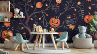 Kids playroom featuring a standard Halloween pumpkins owls wall mural with white furniture and light blue chairs.
