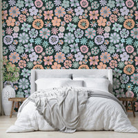 Wallpaper with a pattern of various colorful flowers.

