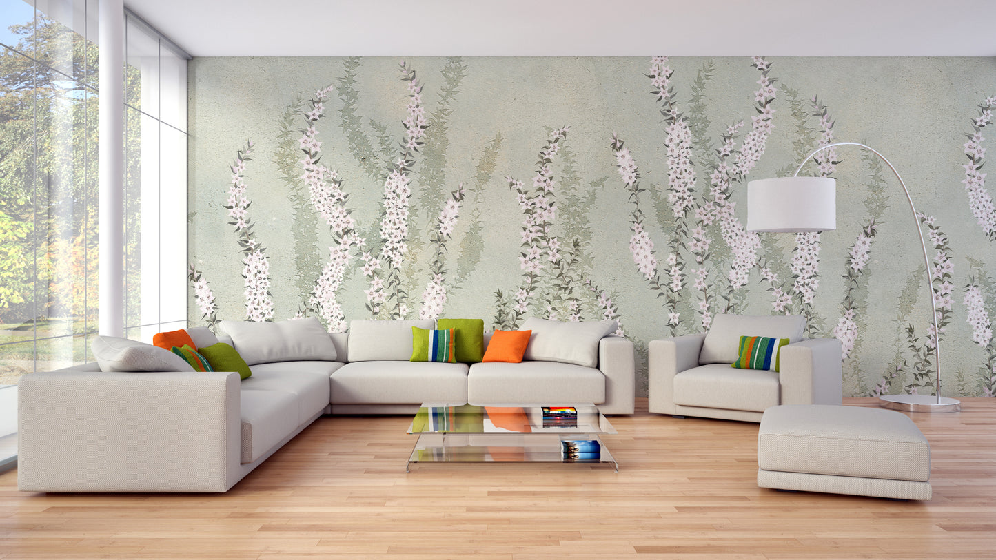 Hanging Flower on Green wallpaper mural with pink blossom spikes on sage green behind a beige sectional and arc lamp