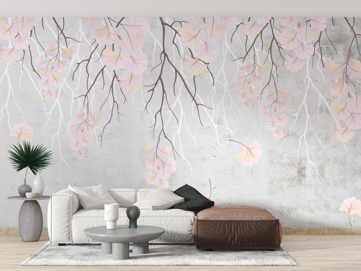 Hanging pink flowers wallpaper mural with cascading pink blooms on grey behind a white sofa in a living room