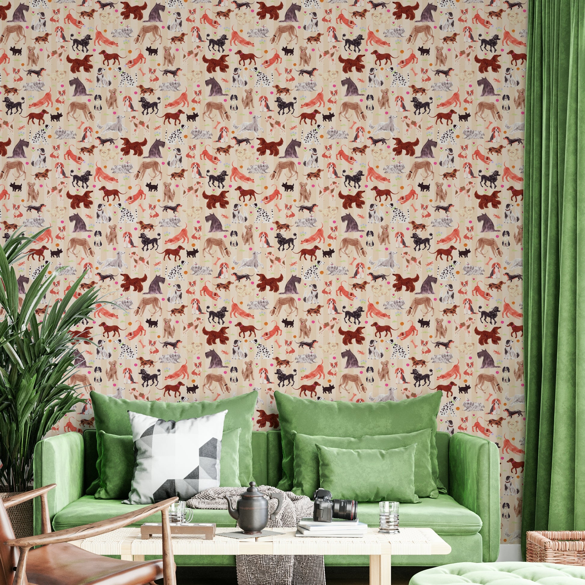 Happy Hounds Dog Doodles wallpaper of illustrated dogs behind a green velvet sofa and wooden coffee table