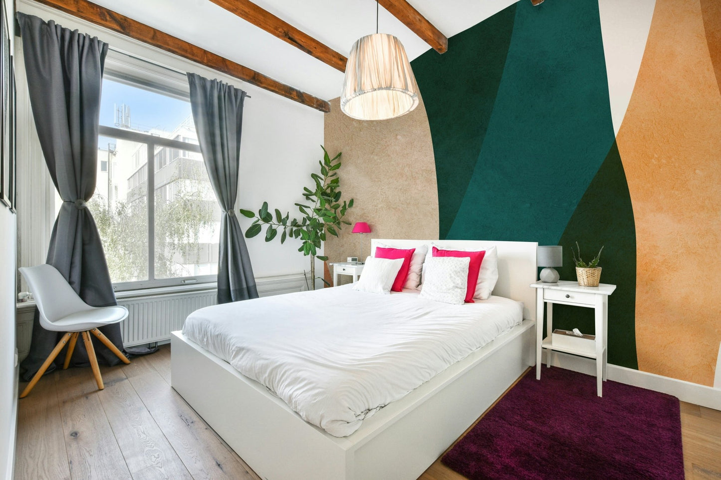 The room feels serene and calm due to the elegant design.

