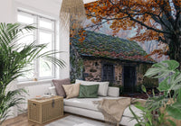 Rustic forest wall mural showing a moss roof, weathered walls, and fallen leaves
