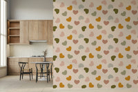 Earthy-toned hearts arranged in a whimsical scattered layout across the Heartfelt Harmony wallpaper.